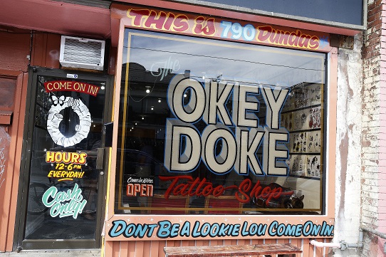 OkeyDoke Tattoo parlour on Dundas St West has some help for the indecisive going in for a tattoo.....A gumball machine that will spit out a randomly chosen pattertn for your tattoo if you cant really pick one.....You spend your $80 and a random ball pops